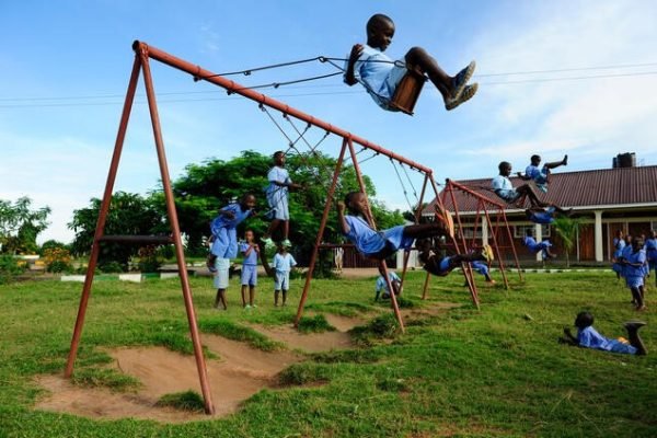 Orphans playing in uniform